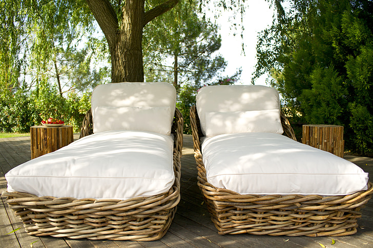 Royalty-Free photo: Two brown wicker lounge chairs | PickPik
