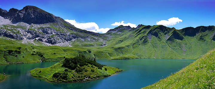 green mountain and lake