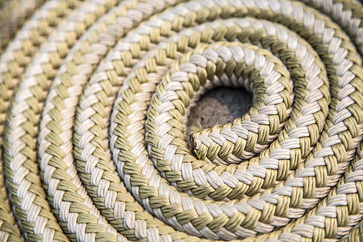close-up photo of brown braided rope