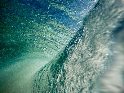 shallow photography of wave