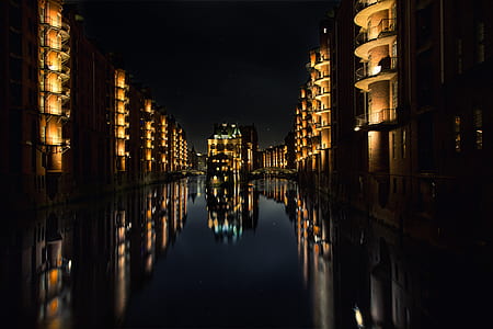 Reflection of Buildings on Water during Nighttime