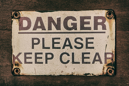 Close up shot of an old danger sign, image captured with a Canon 5D in Kent, England