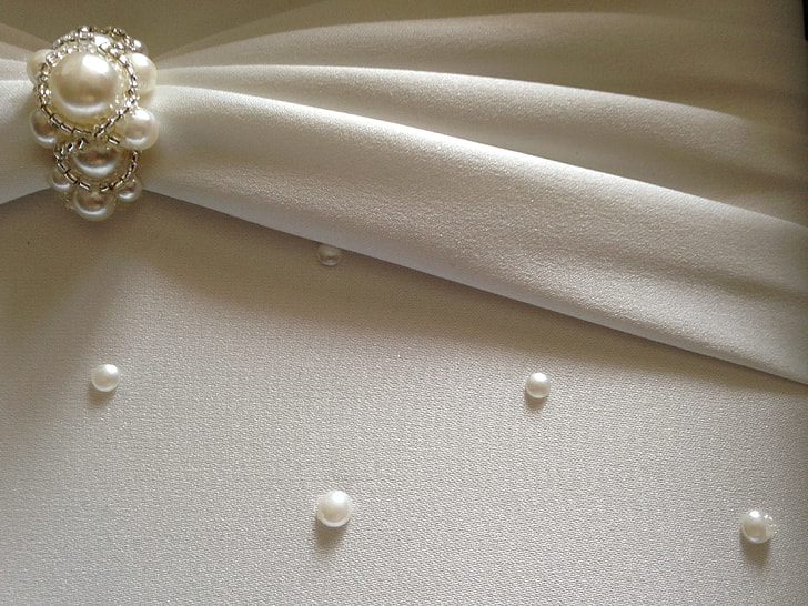 white pearl studded cloth