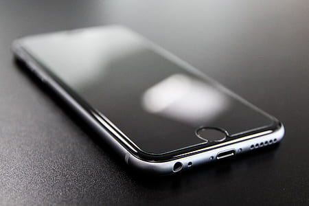 shallow depth of field photography of turned off space gray iPhone 6