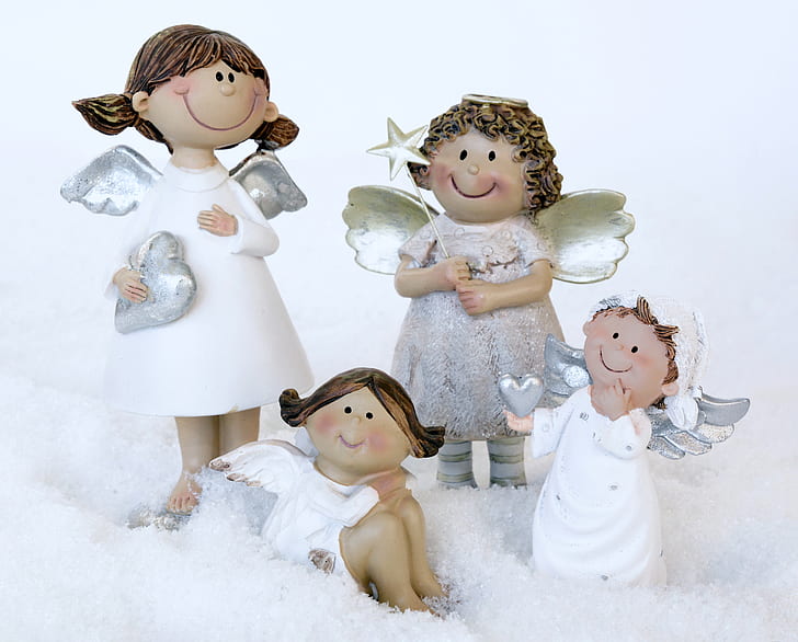 four angel figurines