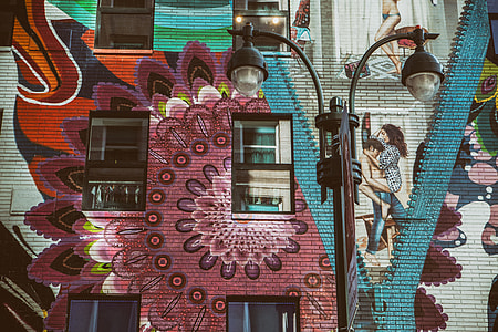 Brightly coloured wall art mural captured in Midtown Manhattan, New York City