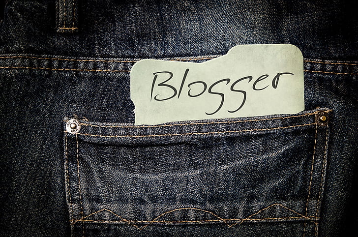 blogger note inside blue denim bottoms pocket