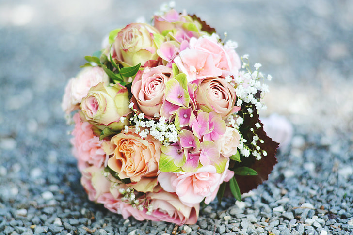 selective focus photography of pink and green flower bouquet