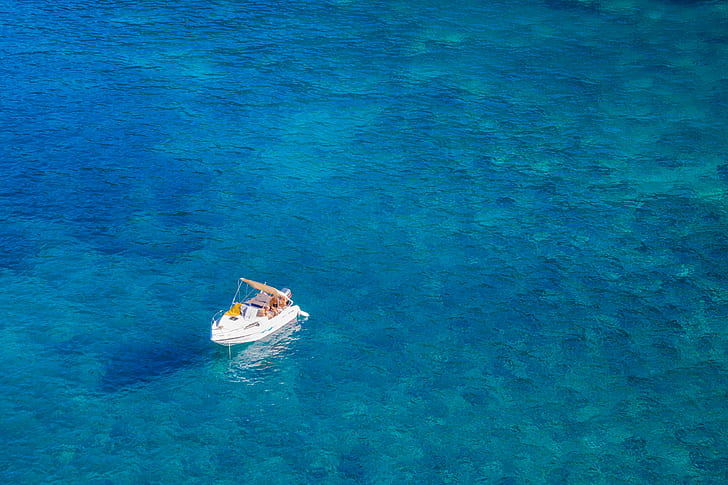 Boat In The Middle Of The Ocean