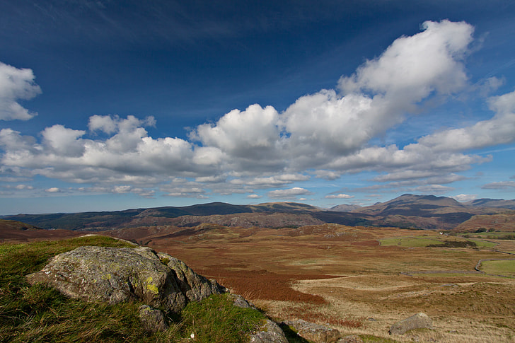 Wide-angle landscape shot taken on a sunny day in the Lake District, Cumbria, England
