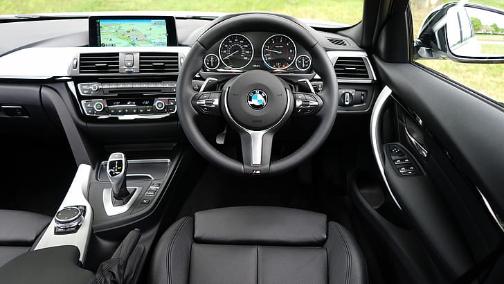 photo of black BMW steering wheel