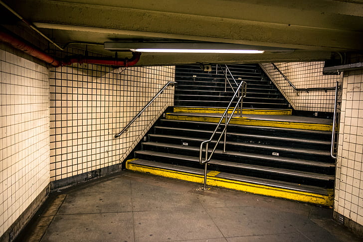 yellow and black metro station stair