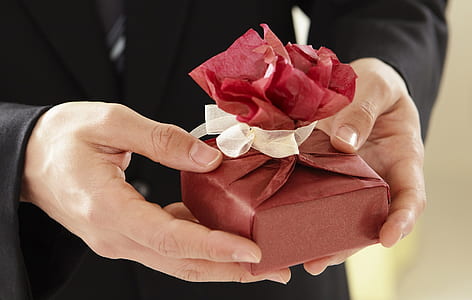 person holding gift