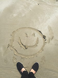 Smiley Drawing on Sand
