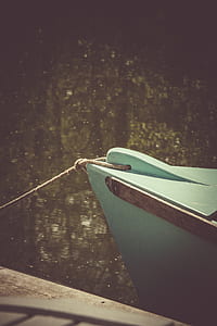Teal Wooden Boat on Lake