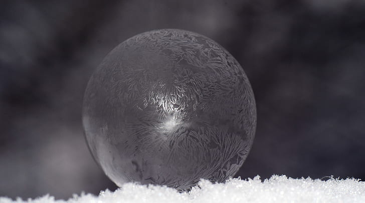 shallow focus photography of clear crystal ball