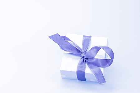 White Box With Purple Ribbon