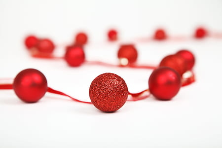 closeup photo of red beaded accessory