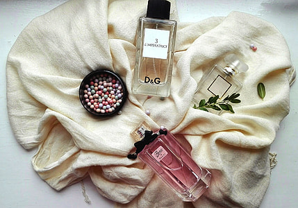 red and white D&G perfume bottles