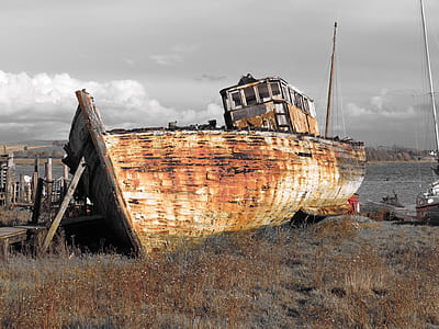 rusted white sailing ship