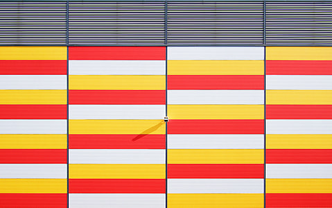 white, yellow, and red painted wall