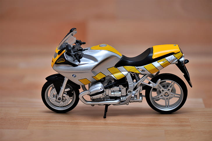 silver and yellow standard motorcycle decoration