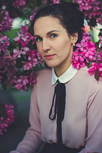 Woman Wearing Pink and White Collared Long Sleeve Dress Shirt Under Blooming Pink Petaled Flower