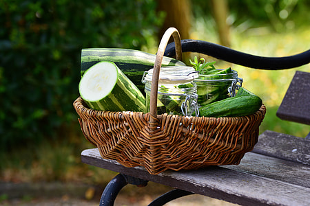 sliced cucumbers on brown wicker basket