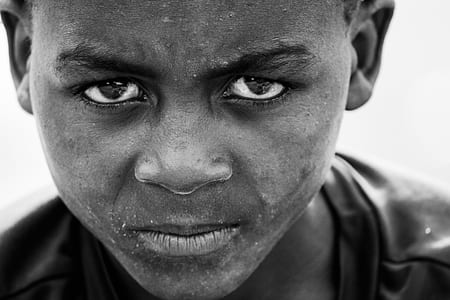 grayscale photography of boy face