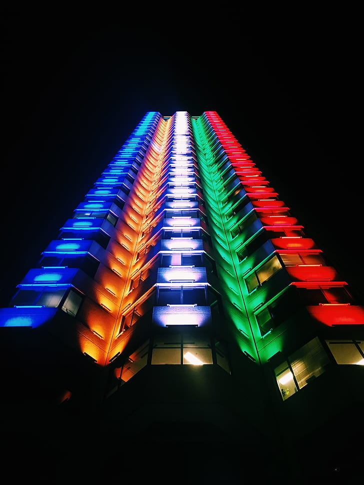 low-angle photography of lighted high-rise building