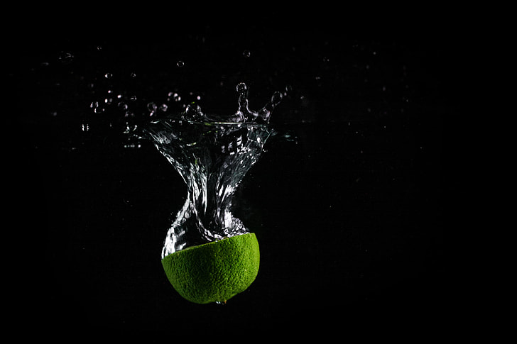 Lime In Water with Black Background