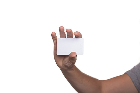 person showing white plastic card