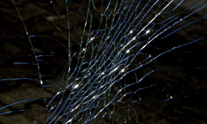 close up photography cracked glass