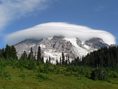 aerial photo of snow mountain covered of clouds