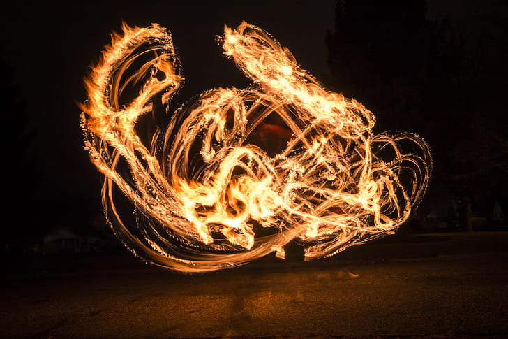 fire dance at nighttime