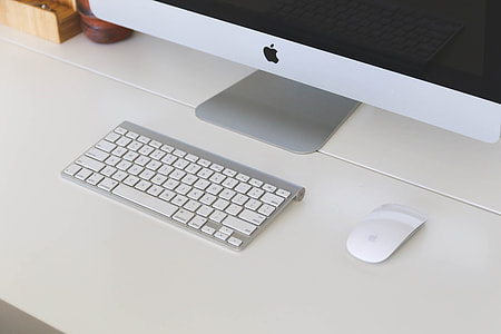 silver and white Apple Magic Mouse and Apple Keyboard