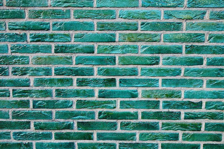 green concrete brick wall