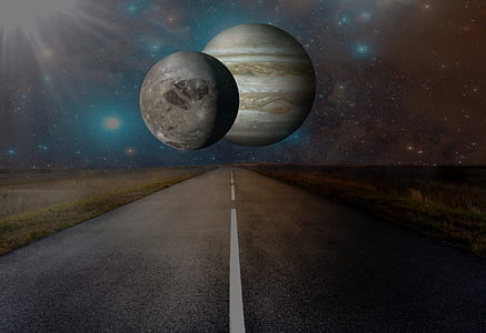 two planets in the middle of the street photo