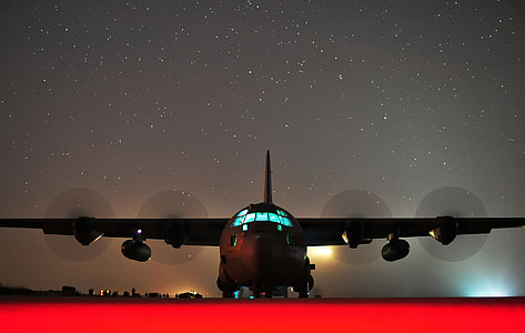 black airplane at nighttime