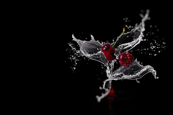 timelapse photography of cherries and water