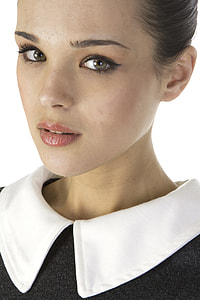 woman wearing black and white collared top