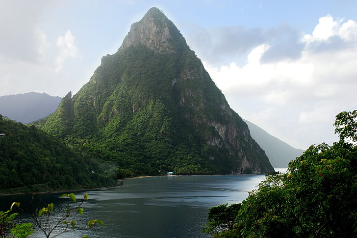 photography of mountain near body of water