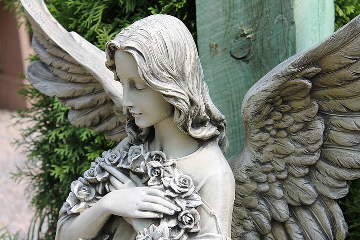 photo of guardian angel concrete sculptuyre