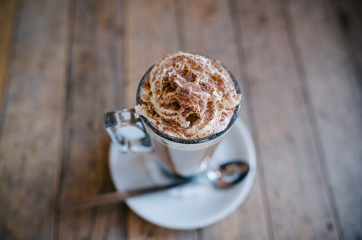 clear glass cup with cappuccino