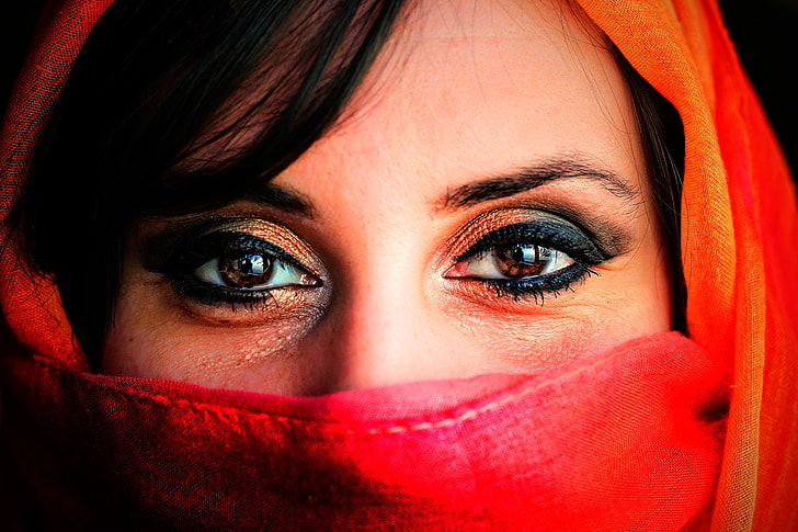 woman wearing red veil