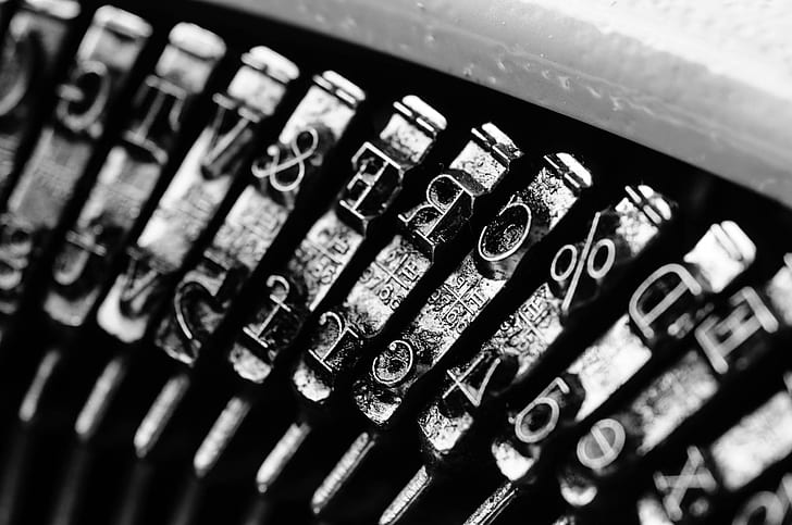 macro photography of typewriter keys