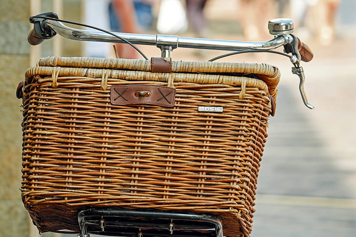 brown wicker basket on top of gray bicycle