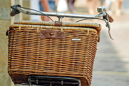 brown wicker basket on top of gray bicycle