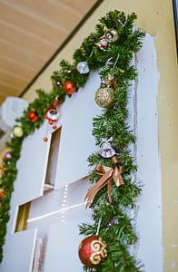 Photo of Green Garland With Bold Bauble Decor
