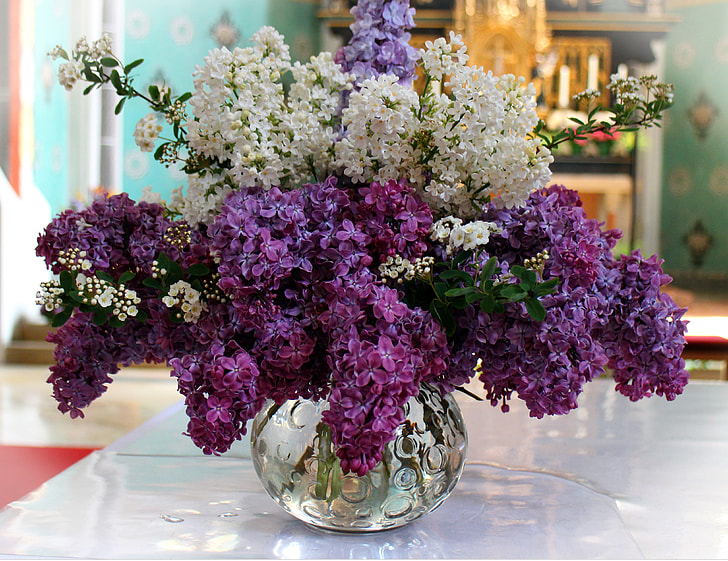 white and purple artificial flower decors